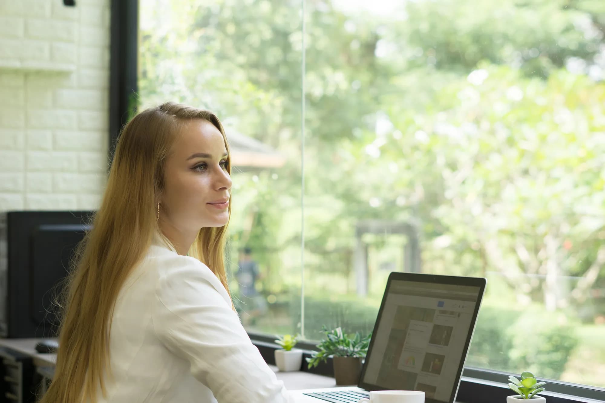 A business owner searching for public sector opportunities on a laptop