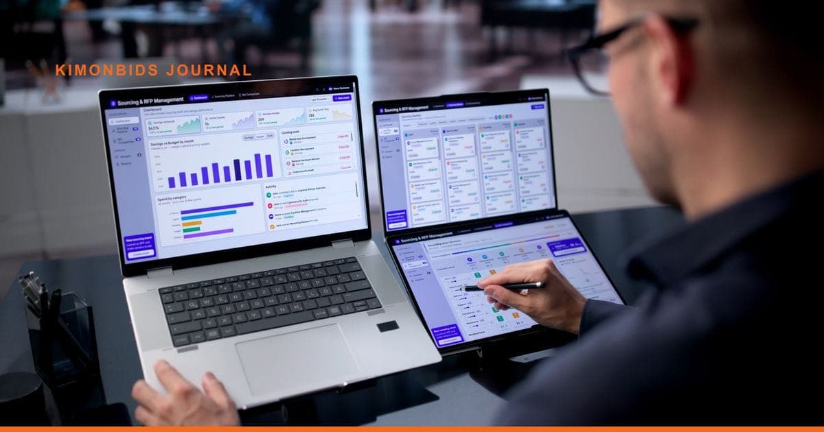 A man uses a stylus on a dual-screen laptop showing sourcing dashboards, beside a second open laptop.